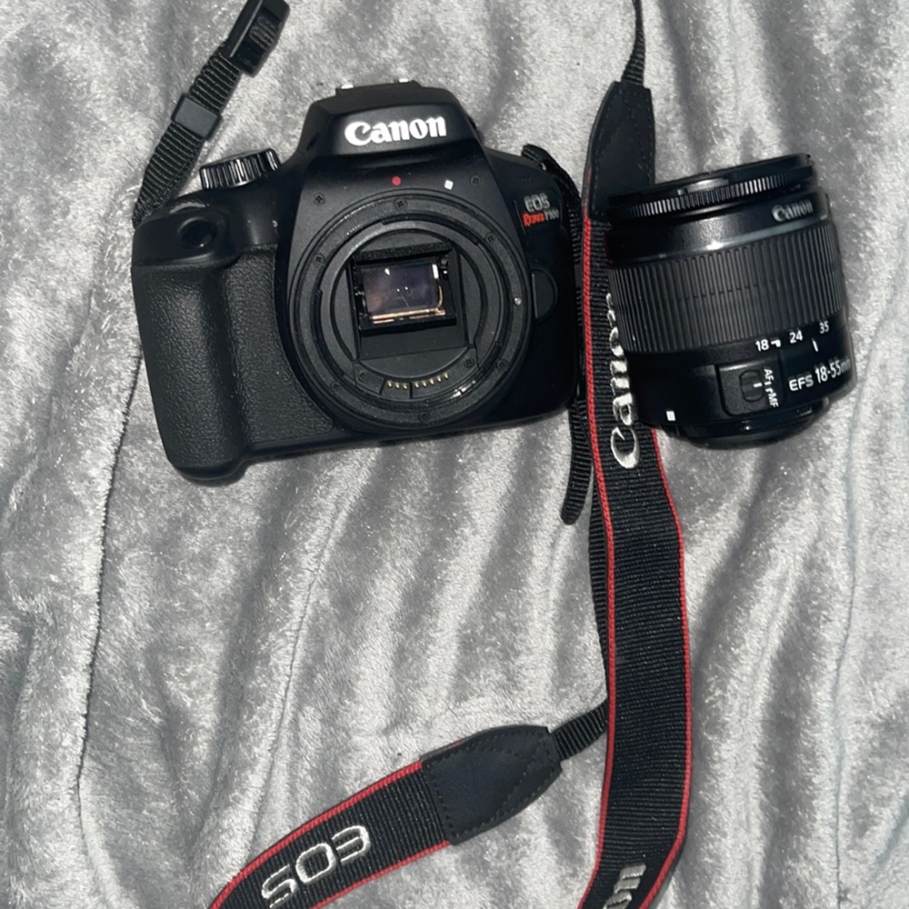 Canon EOS Rebel T100 DSLR camera Body & Lens